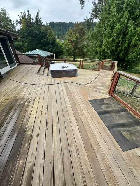 Before and after outdoor wood deck painting and surface restoration in Roseburg, OR